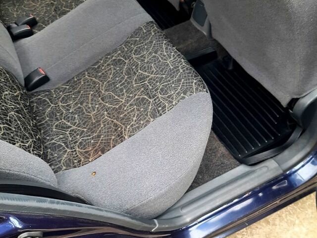 Синий Дэу Ланос, объемом двигателя 1.5 л и пробегом 220 тыс. км за 2000 $, фото 4 на Automoto.ua