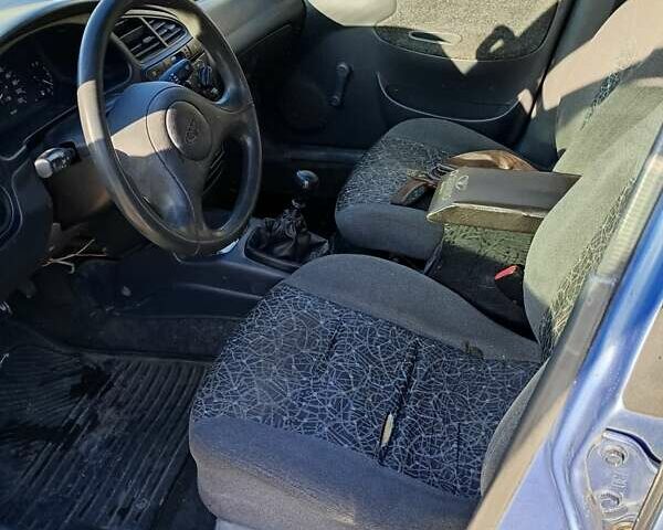 Синій Деу Ланос, об'ємом двигуна 1.5 л та пробігом 195 тис. км за 1100 $, фото 4 на Automoto.ua