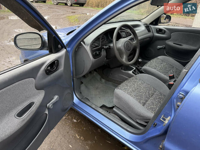 Синий Дэу Ланос, объемом двигателя 1.4 л и пробегом 224 тыс. км за 1390 $, фото 9 на Automoto.ua