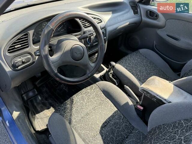 Синий Дэу Ланос, объемом двигателя 1.5 л и пробегом 256 тыс. км за 1550 $, фото 9 на Automoto.ua