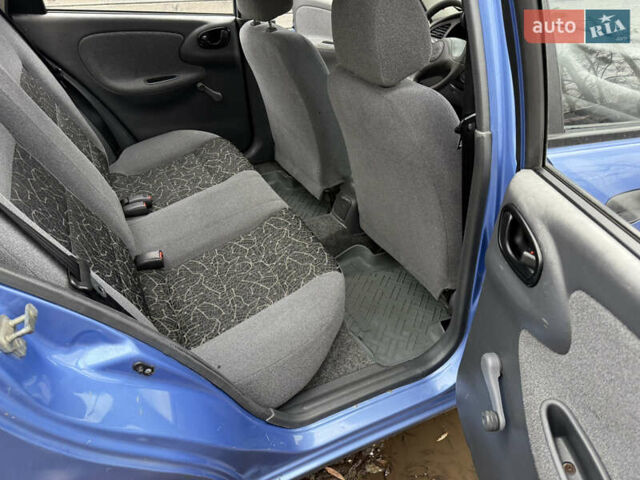 Синий Дэу Ланос, объемом двигателя 1.3 л и пробегом 224 тыс. км за 1490 $, фото 16 на Automoto.ua