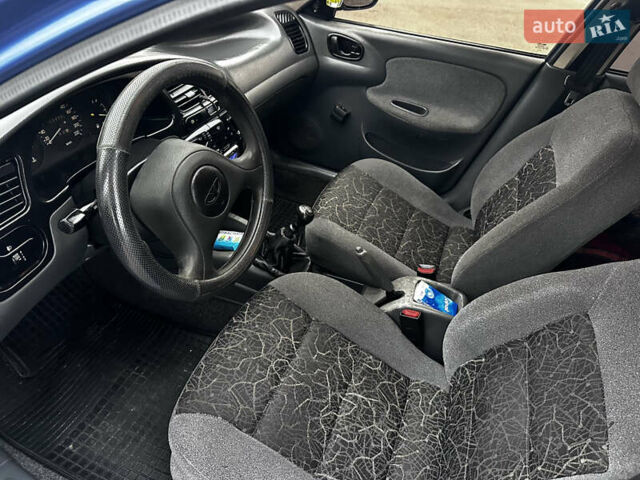Синій Деу Ланос, об'ємом двигуна 1.5 л та пробігом 201 тис. км за 2350 $, фото 17 на Automoto.ua