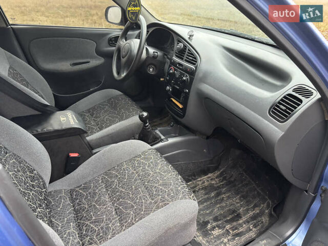 Синій Деу Ланос, об'ємом двигуна 1.39 л та пробігом 200 тис. км за 2350 $, фото 8 на Automoto.ua