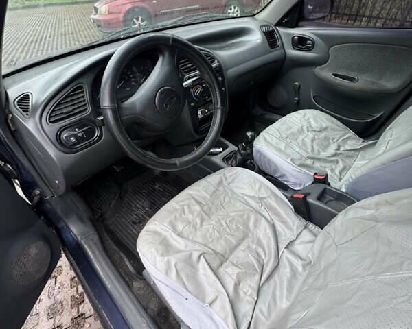 Синий Дэу Ланос, объемом двигателя 1.5 л и пробегом 222 тыс. км за 1500 $, фото 9 на Automoto.ua