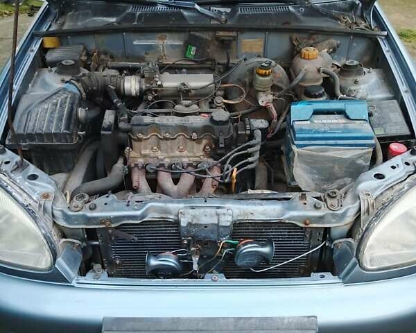 Синий Дэу Ланос, объемом двигателя 1.5 л и пробегом 230 тыс. км за 2600 $, фото 7 на Automoto.ua