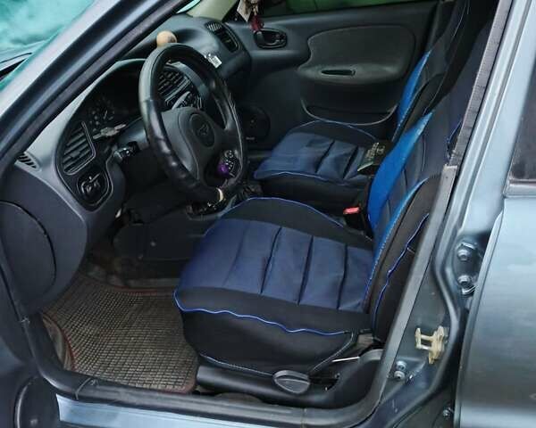 Синий Дэу Ланос, объемом двигателя 1.5 л и пробегом 230 тыс. км за 2600 $, фото 5 на Automoto.ua