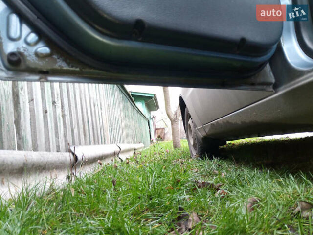 Синий Дэу Ланос, объемом двигателя 1.6 л и пробегом 310 тыс. км за 2200 $, фото 15 на Automoto.ua