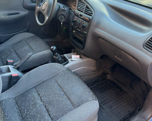 Синій Деу Ланос, об'ємом двигуна 1.5 л та пробігом 346 тис. км за 1050 $, фото 9 на Automoto.ua