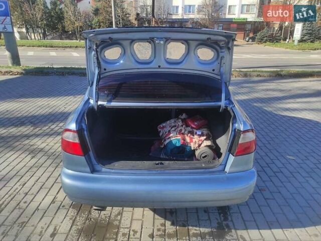 Деу Ланос 2008 у Івано-Франківську на Automoto.ua Синій Деу Ланос, об'ємом двигуна 1.6 л та пробігом 89 тис. км за 2999 $, фото 14 на Automoto.ua