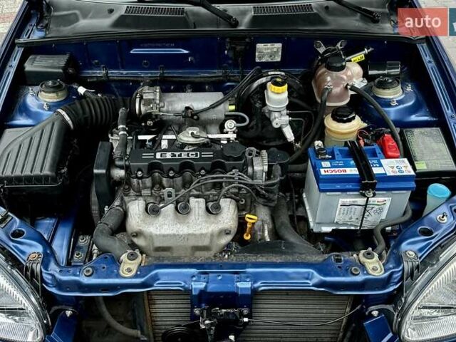 Синій Деу Ланос, об'ємом двигуна 1.5 л та пробігом 59 тис. км за 4200 $, фото 36 на Automoto.ua
