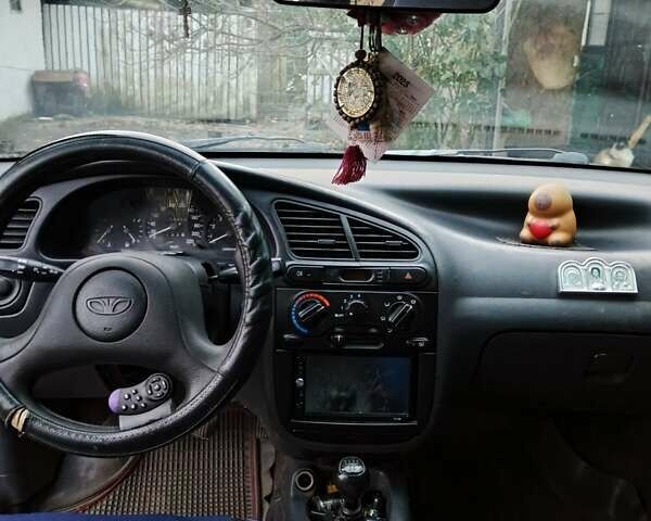 Синий Дэу Ланос, объемом двигателя 1.5 л и пробегом 230 тыс. км за 2600 $, фото 6 на Automoto.ua