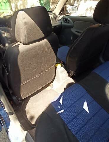 Синий Дэу Ланос, объемом двигателя 1.5 л и пробегом 170 тыс. км за 1850 $, фото 5 на Automoto.ua