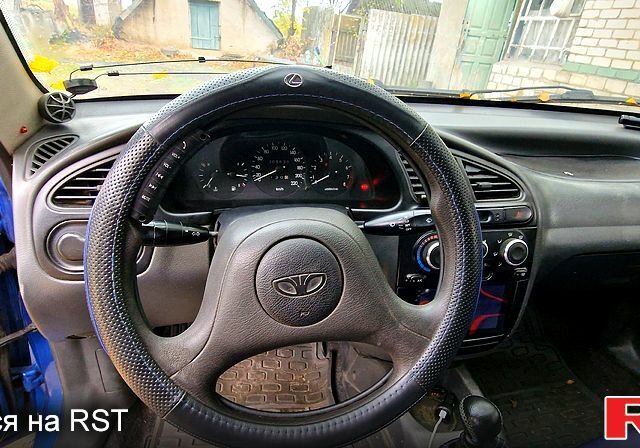 Синий Дэу Ланос, объемом двигателя 1.5 л и пробегом 308 тыс. км за 2600 $, фото 2 на Automoto.ua
