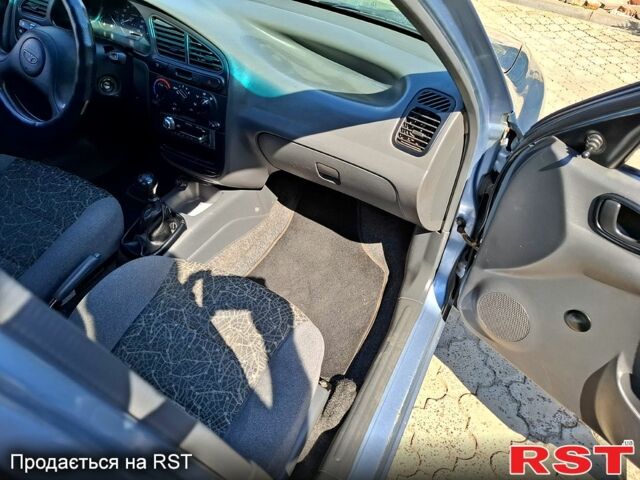 Синий Дэу Ланос, объемом двигателя 1.5 л и пробегом 155 тыс. км за 2600 $, фото 6 на Automoto.ua