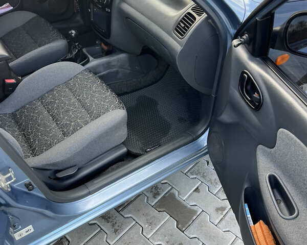 Синій Деу Ланос, об'ємом двигуна 1.5 л та пробігом 116 тис. км за 3700 $, фото 12 на Automoto.ua