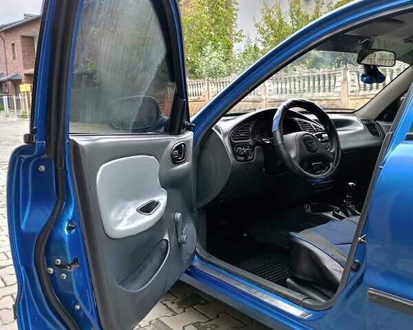 Синій Деу Ланос, об'ємом двигуна 1.5 л та пробігом 359 тис. км за 2000 $, фото 16 на Automoto.ua