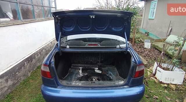 Синій Деу Ланос, об'ємом двигуна 1.5 л та пробігом 182 тис. км за 1350 $, фото 4 на Automoto.ua