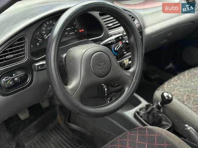Синий Дэу Ланос, объемом двигателя 1.5 л и пробегом 180 тыс. км за 3299 $, фото 6 на Automoto.ua