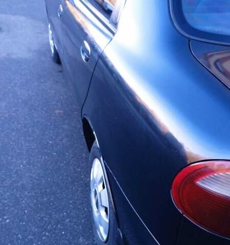 Синий Дэу Ланос, объемом двигателя 1.5 л и пробегом 343 тыс. км за 2300 $, фото 2 на Automoto.ua