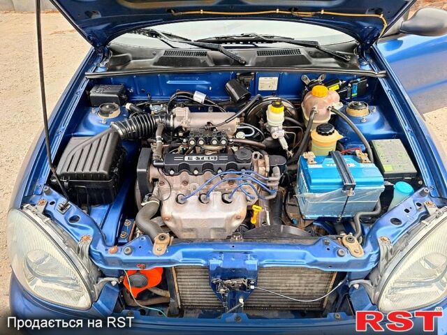 Синий Дэу Ланос, объемом двигателя 1.5 л и пробегом 86 тыс. км за 2600 $, фото 6 на Automoto.ua