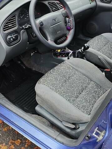 Синій Деу Ланос, об'ємом двигуна 1.6 л та пробігом 265 тис. км за 1900 $, фото 4 на Automoto.ua