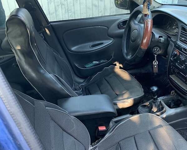 Синий Дэу Ланос, объемом двигателя 1.5 л и пробегом 100 тыс. км за 2000 $, фото 3 на Automoto.ua