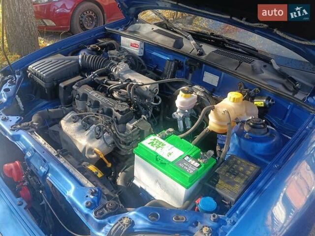 Синий Дэу Ланос, объемом двигателя 1.5 л и пробегом 100 тыс. км за 2750 $, фото 38 на Automoto.ua