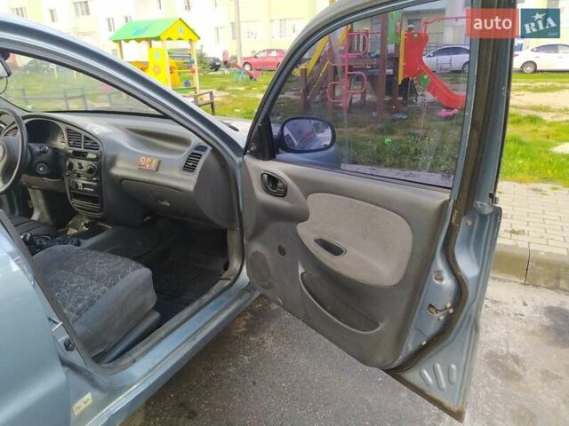 Синий Дэу Ланос, объемом двигателя 1.5 л и пробегом 200 тыс. км за 800 $, фото 10 на Automoto.ua
