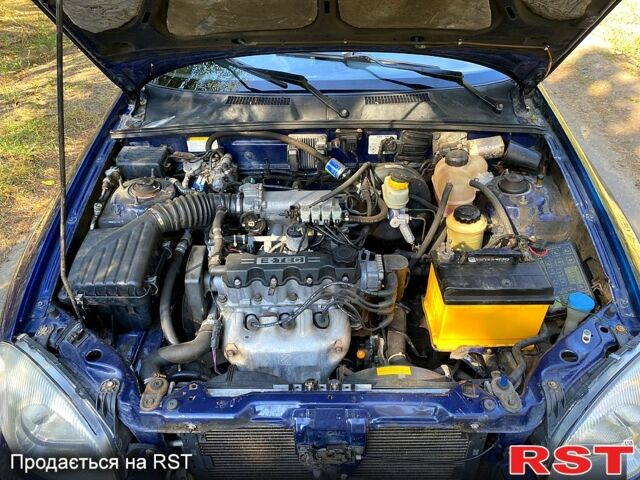 Синий Дэу Ланос, объемом двигателя 1.5 л и пробегом 264 тыс. км за 2150 $, фото 12 на Automoto.ua