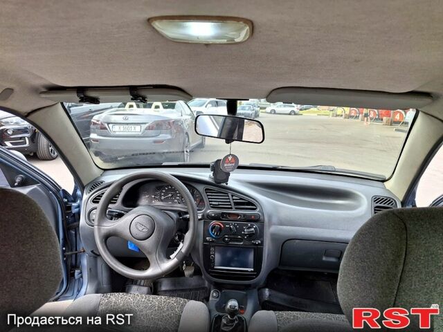 Синій Деу Ланос, об'ємом двигуна 1.5 л та пробігом 188 тис. км за 3500 $, фото 4 на Automoto.ua