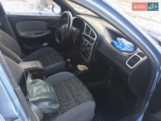 Синий Дэу Ланос, объемом двигателя 1.5 л и пробегом 140 тыс. км за 3400 $, фото 10 на Automoto.ua