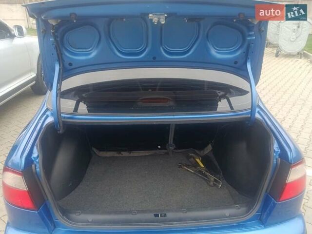 Синий Дэу Ланос, объемом двигателя 1.5 л и пробегом 100 тыс. км за 2750 $, фото 4 на Automoto.ua
