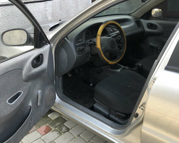 Синий Дэу Ланос, объемом двигателя 0 л и пробегом 474 тыс. км за 999 $, фото 22 на Automoto.ua