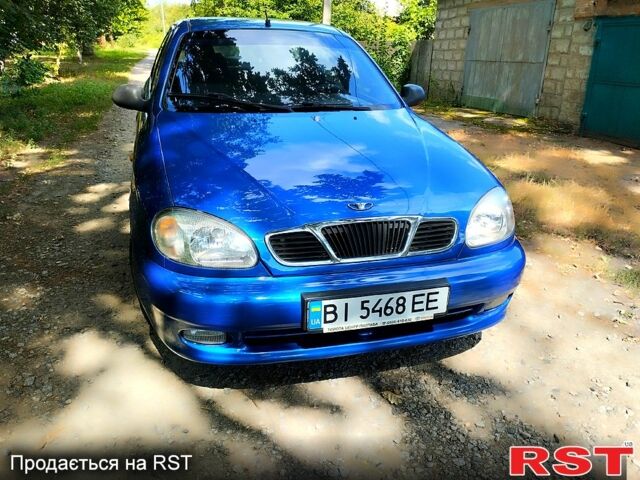 Синий Дэу Ланос, объемом двигателя 1.5 л и пробегом 210 тыс. км за 2570 $, фото 2 на Automoto.ua