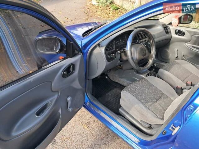 Синій Деу Ланос, об'ємом двигуна 1.5 л та пробігом 359 тис. км за 2350 $, фото 11 на Automoto.ua