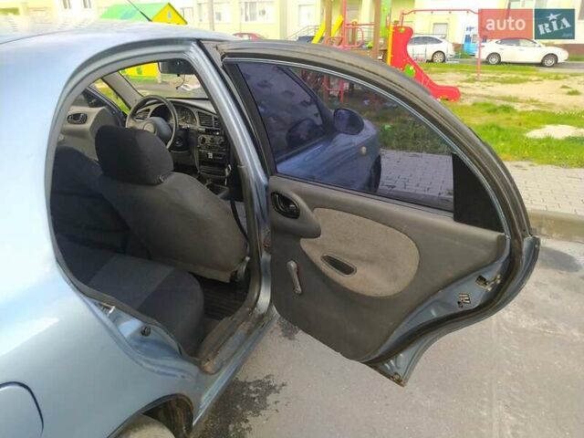 Синий Дэу Ланос, объемом двигателя 1.5 л и пробегом 200 тыс. км за 800 $, фото 11 на Automoto.ua