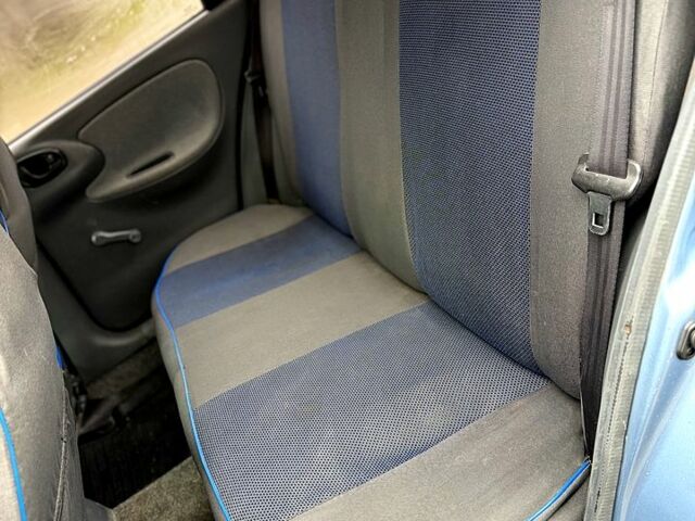 Синий Дэу Ланос, объемом двигателя 1.4 л и пробегом 75 тыс. км за 1999 $, фото 9 на Automoto.ua