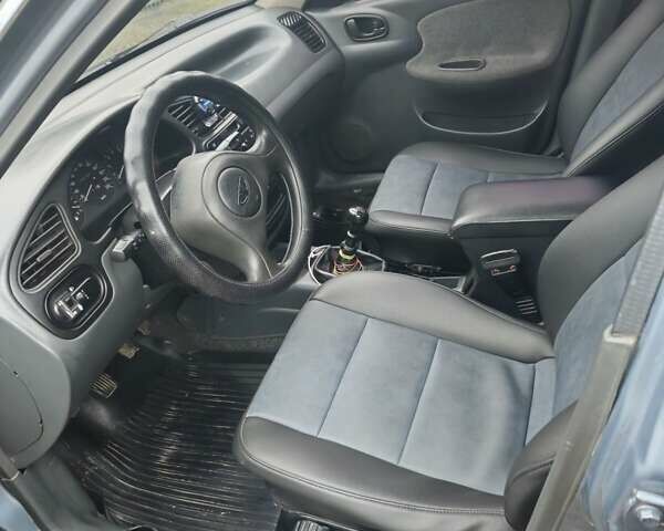 Синій Деу Ланос, об'ємом двигуна 1.5 л та пробігом 249 тис. км за 2350 $, фото 28 на Automoto.ua
