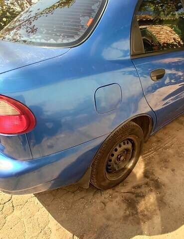 Синий Дэу Ланос, объемом двигателя 1.5 л и пробегом 170 тыс. км за 1850 $, фото 20 на Automoto.ua