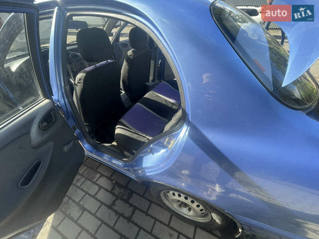 Синий Дэу Ланос, объемом двигателя 1.5 л и пробегом 102 тыс. км за 2600 $, фото 7 на Automoto.ua