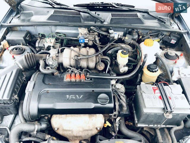 Синий Дэу Ланос, объемом двигателя 1.6 л и пробегом 310 тыс. км за 2200 $, фото 10 на Automoto.ua