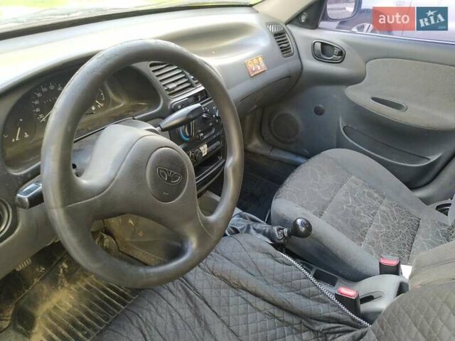 Синий Дэу Ланос, объемом двигателя 1.5 л и пробегом 200 тыс. км за 800 $, фото 16 на Automoto.ua