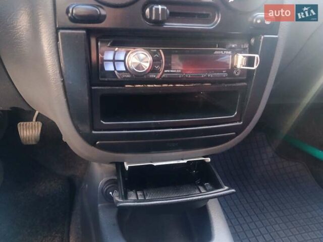 Синий Дэу Ланос, объемом двигателя 1.5 л и пробегом 100 тыс. км за 2750 $, фото 33 на Automoto.ua