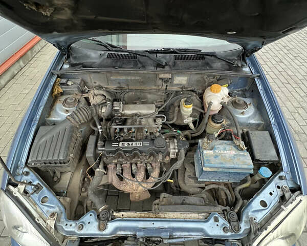 Синий Дэу Ланос, объемом двигателя 1.5 л и пробегом 200 тыс. км за 2150 $, фото 10 на Automoto.ua