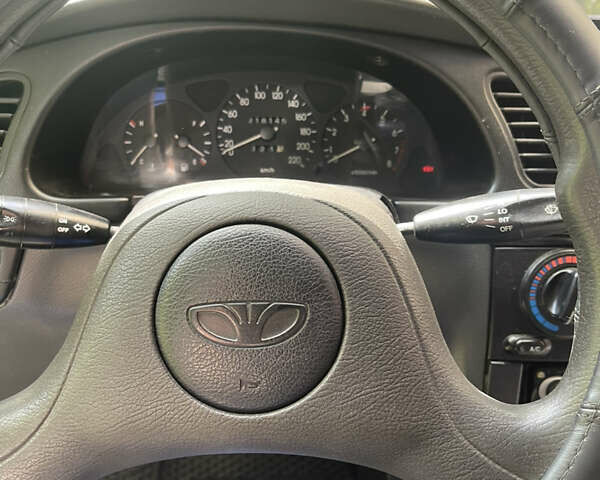 Синий Дэу Ланос, объемом двигателя 1.5 л и пробегом 218 тыс. км за 2700 $, фото 8 на Automoto.ua