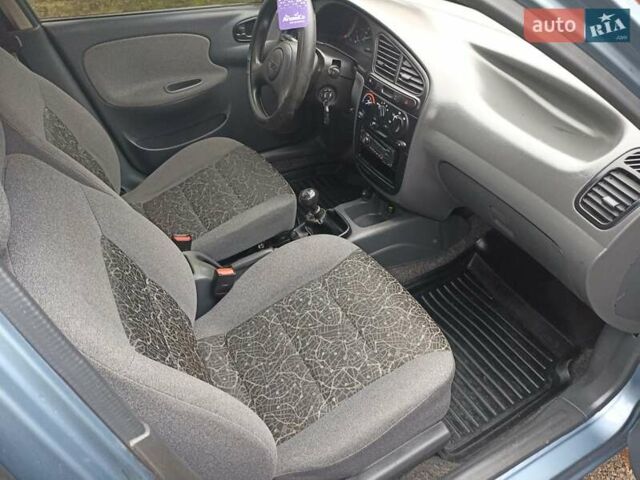 Синий Дэу Ланос, объемом двигателя 1.5 л и пробегом 125 тыс. км за 2900 $, фото 6 на Automoto.ua