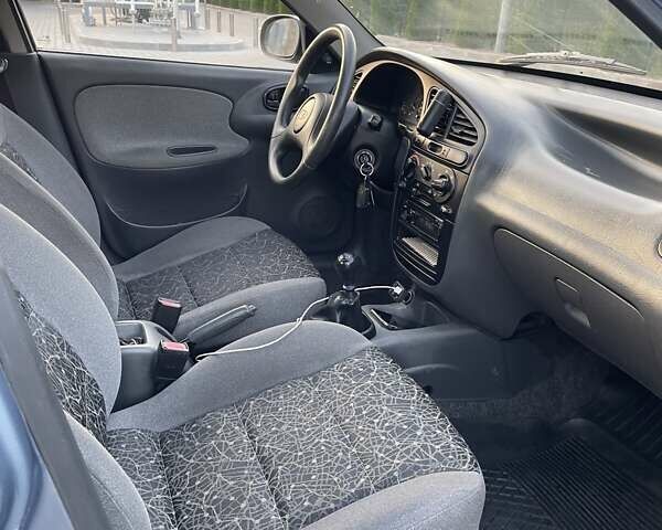 Синий Дэу Ланос, объемом двигателя 1.5 л и пробегом 162 тыс. км за 2750 $, фото 11 на Automoto.ua