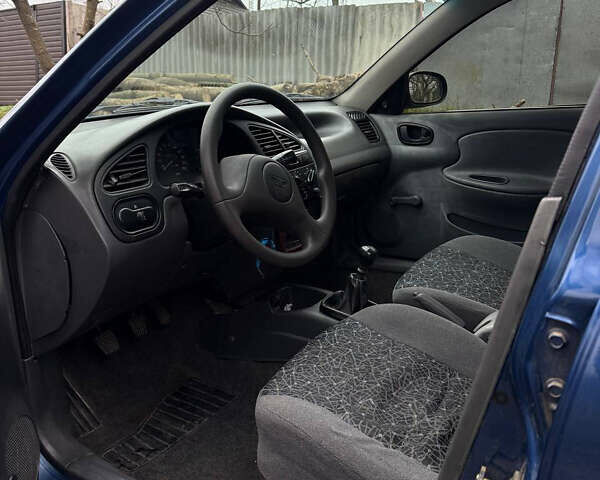 Синий Дэу Ланос, объемом двигателя 1.5 л и пробегом 30 тыс. км за 2300 $, фото 3 на Automoto.ua