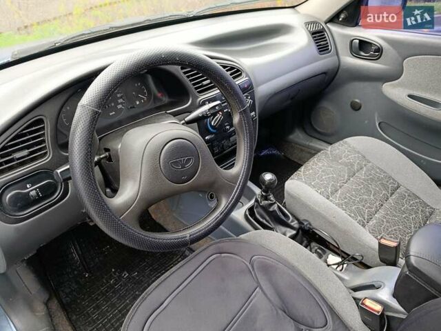 Синій Деу Ланос, об'ємом двигуна 1.5 л та пробігом 183 тис. км за 2450 $, фото 12 на Automoto.ua