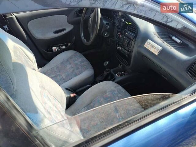 Синий Дэу Ланос, объемом двигателя 1.5 л и пробегом 170 тыс. км за 2000 $, фото 6 на Automoto.ua